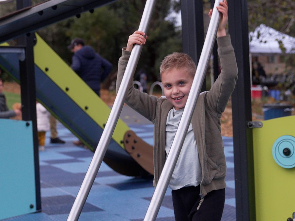 Child enjoying playing on the newly created Burwood Playground.