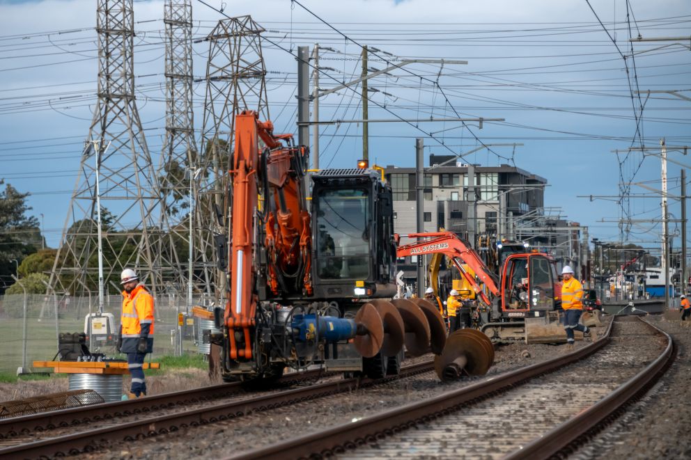 Workers on the tracks at Keon Parade