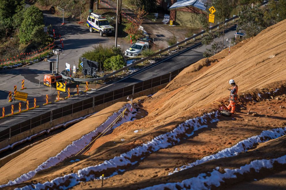 Snow melting on the Bogong High Plains Rd landslip benches