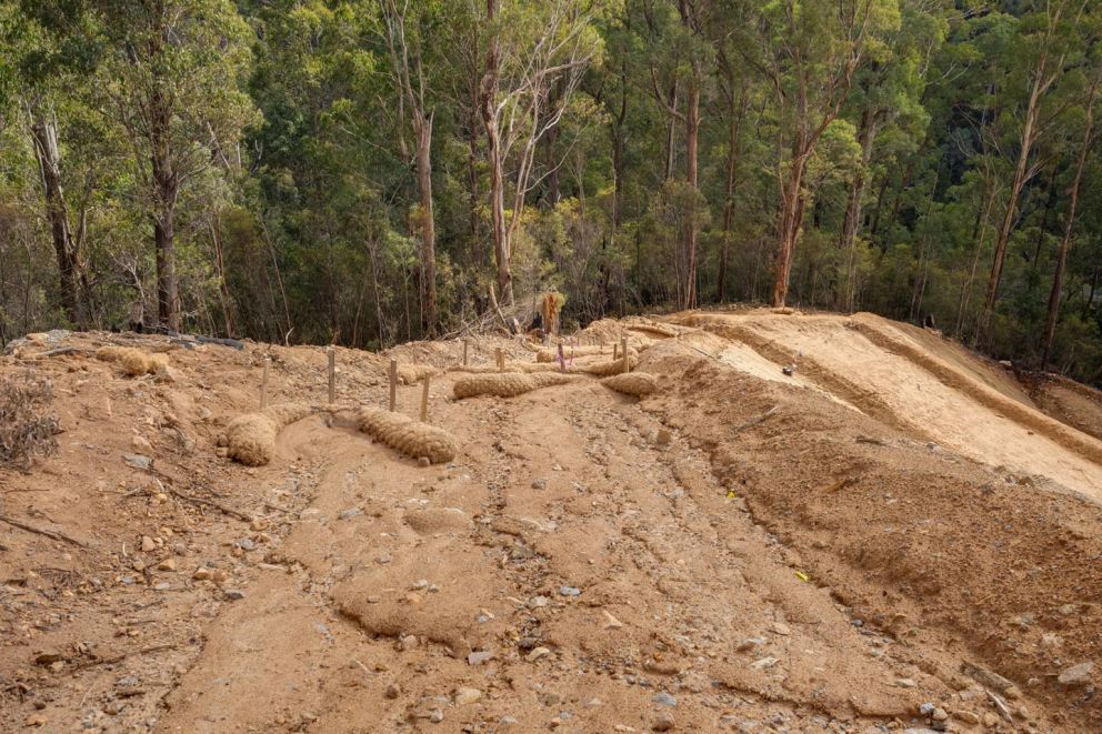 Coir logs helping to contain soil sediment following rain events