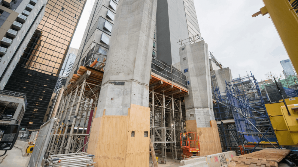 Two concrete columns outside State Library Station's future entrance