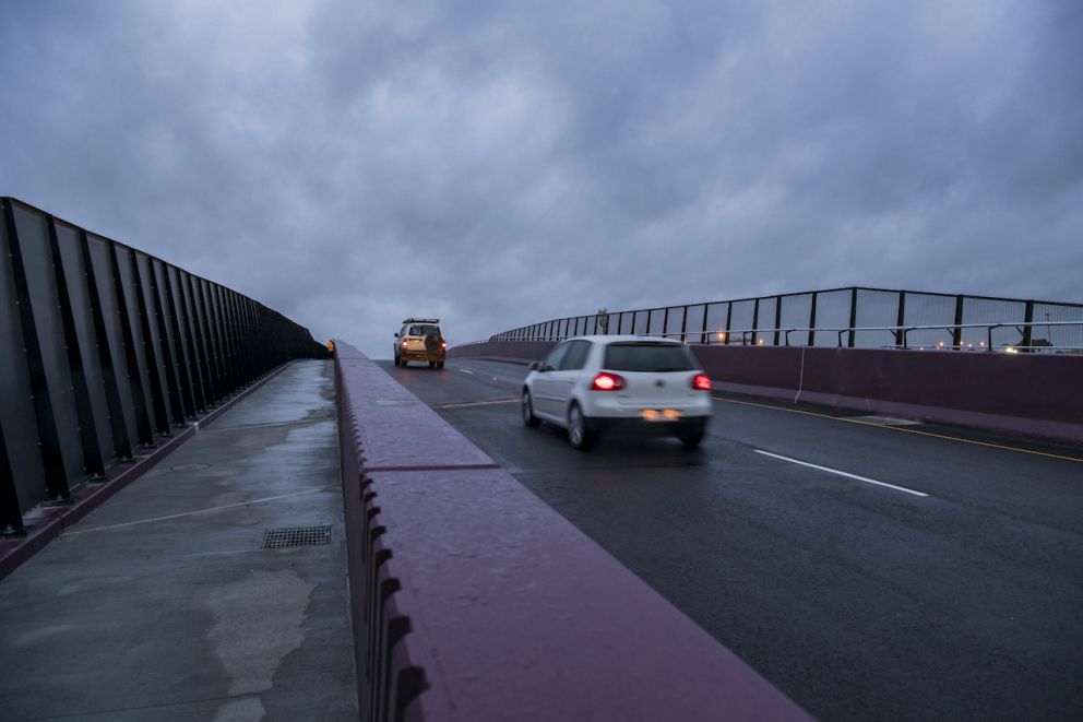 Vehicles travelling over the new Camms Road bridge for the first time