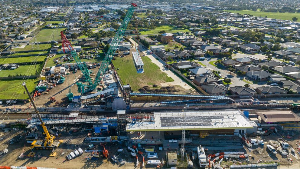 Marshall Station overpass is lifted into place. 