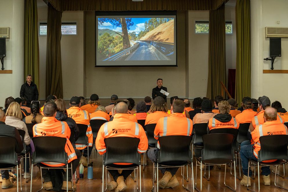 Crews meet at 7am for a pre-opening toolbox talk at the Mt Beauty Community Centre on 27 May