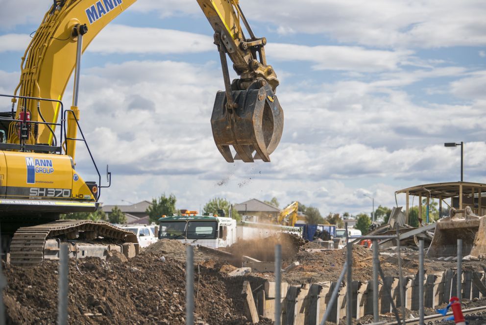 Crews recycling construction waste