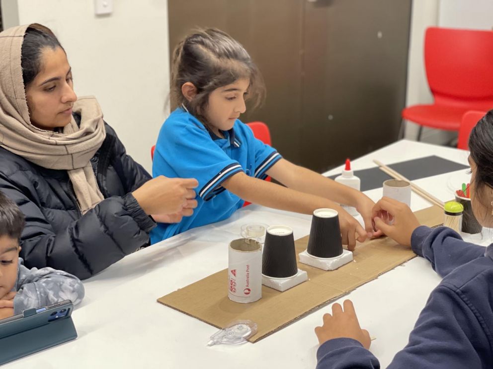 Building bridges with local school students.