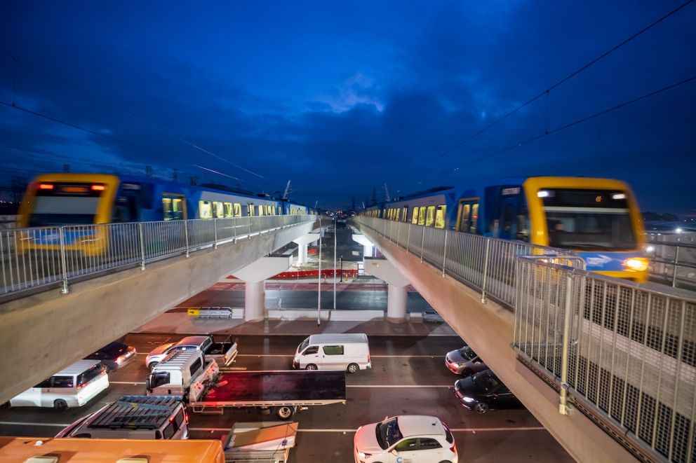 Mernda and City bound trains on viaducts over Keon Parade