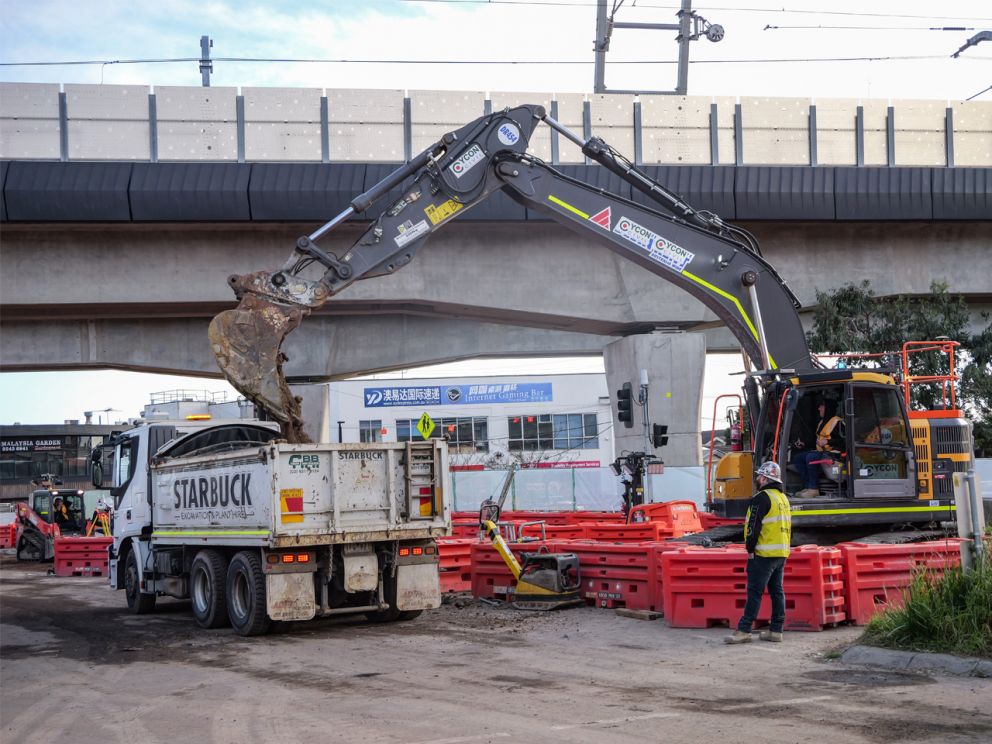 Crews and trucks onsite for Clayton Road works.