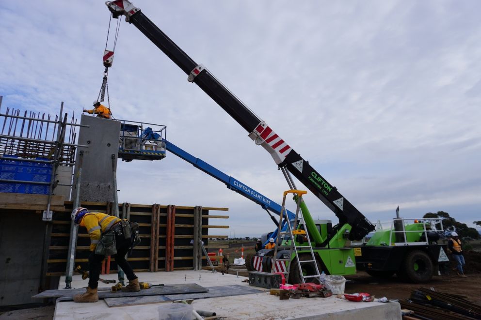 A total of 23 L-shaped panels will be lifted into place
