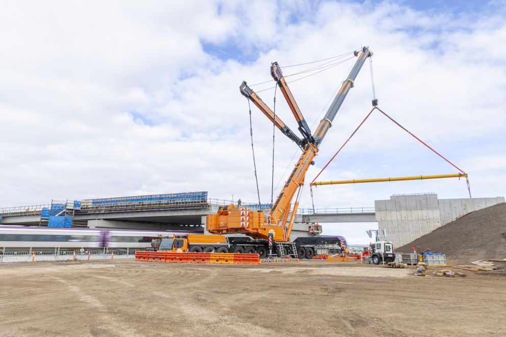 Two cranes weighing up to 750 tonnes lifted the last bridge beams into place