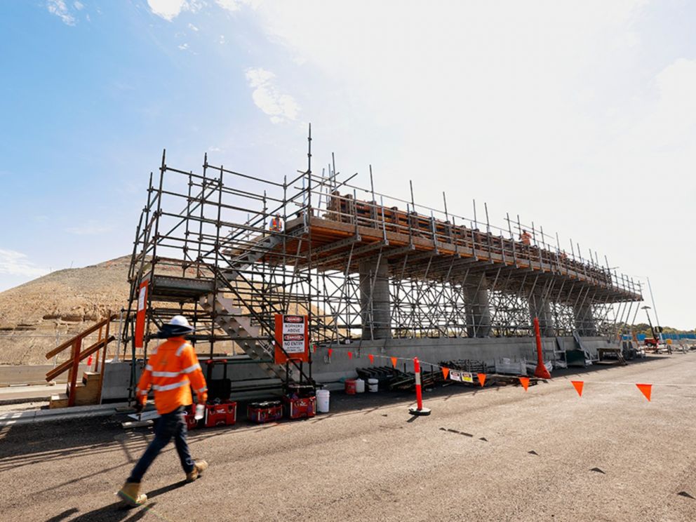 Continuing to build the bridge over Governor Road