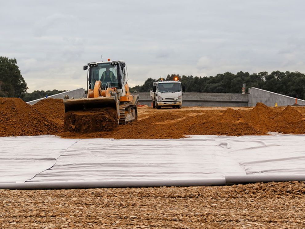 Bringing in material to build the foundations of the Freeway near Braeside Park - July 2020