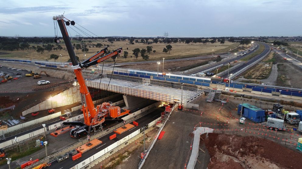 A 750 tonne crane preparing to lift bridge beams into place over the Hume Freeway