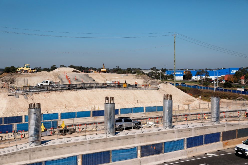 Crews continuing to build the centre support and abutments for the bridge over Springvale Road 