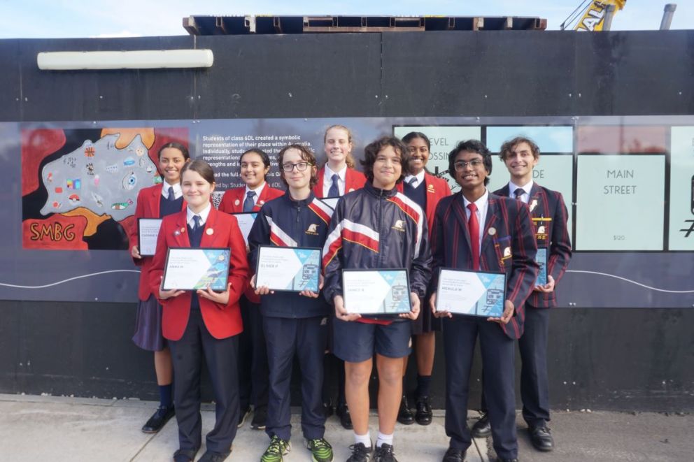 St Margaret’s Berwick Grammar students were presented certificates for bringing site fencing to life with their artwork