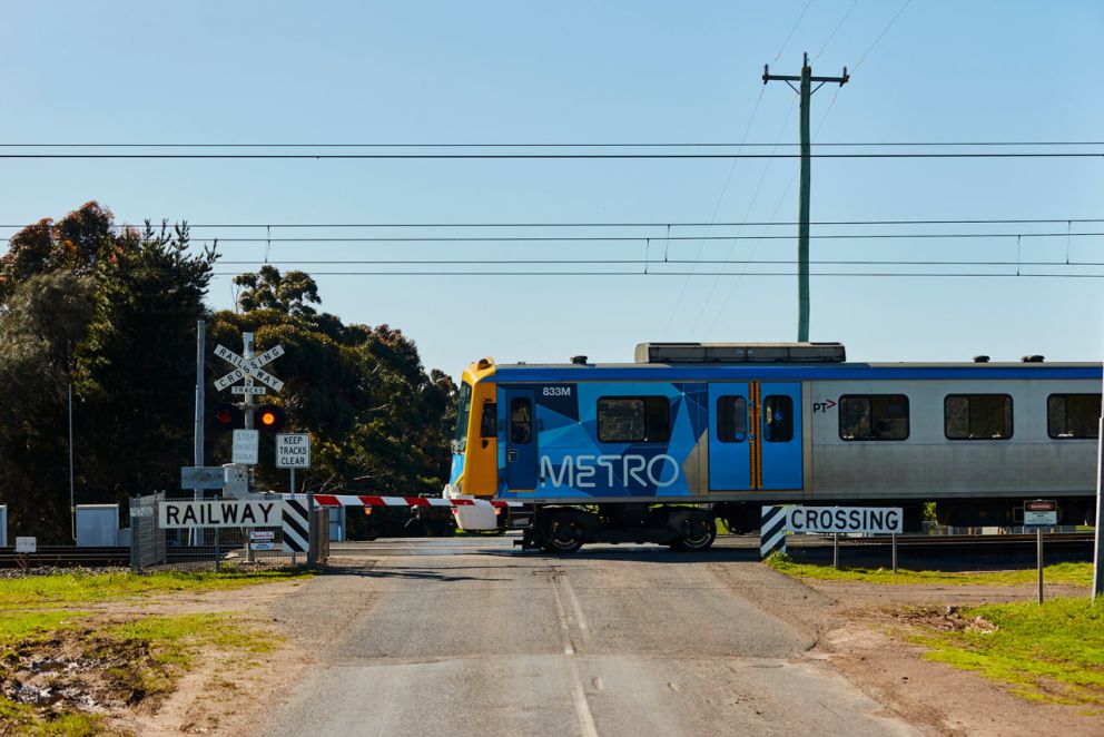 Train passing through the Watsons Road level crossing