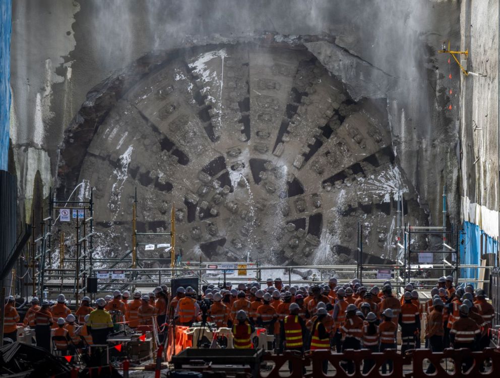 Workers witnessing the moment TBM Vida breaks through the head wall.