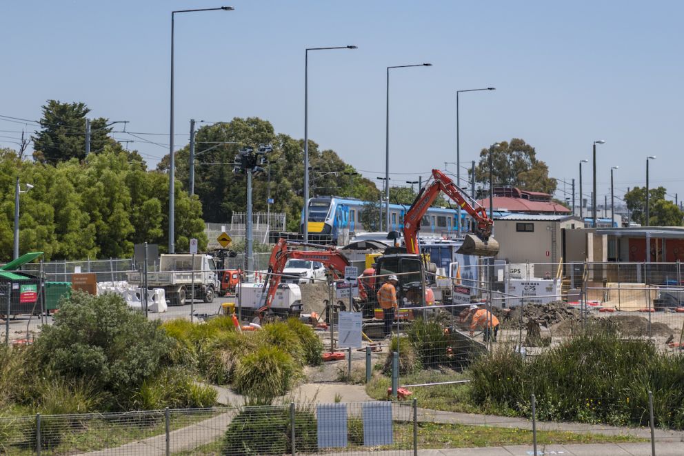 Major construction works at Webb Street, train stopped at Narre Warren Station in background