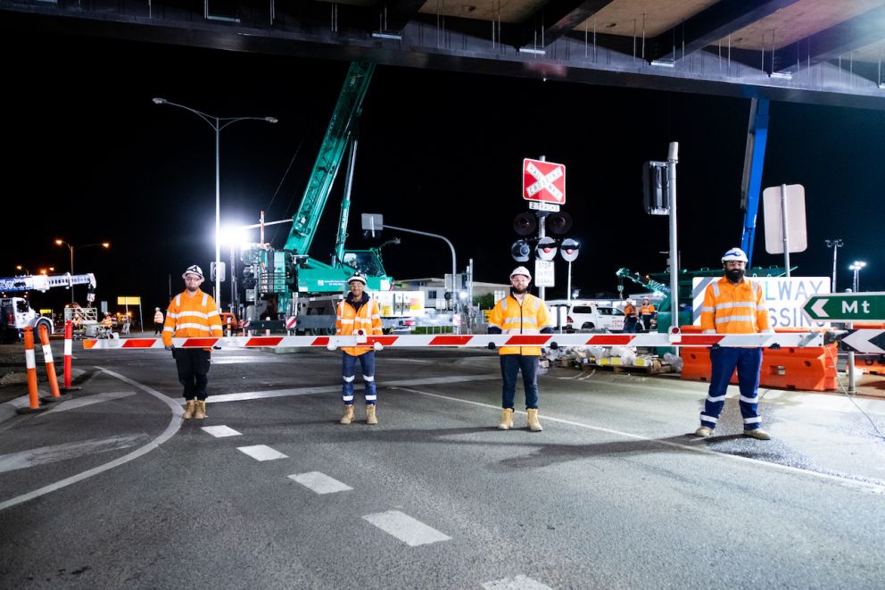 Crews hold the now removed boom gate