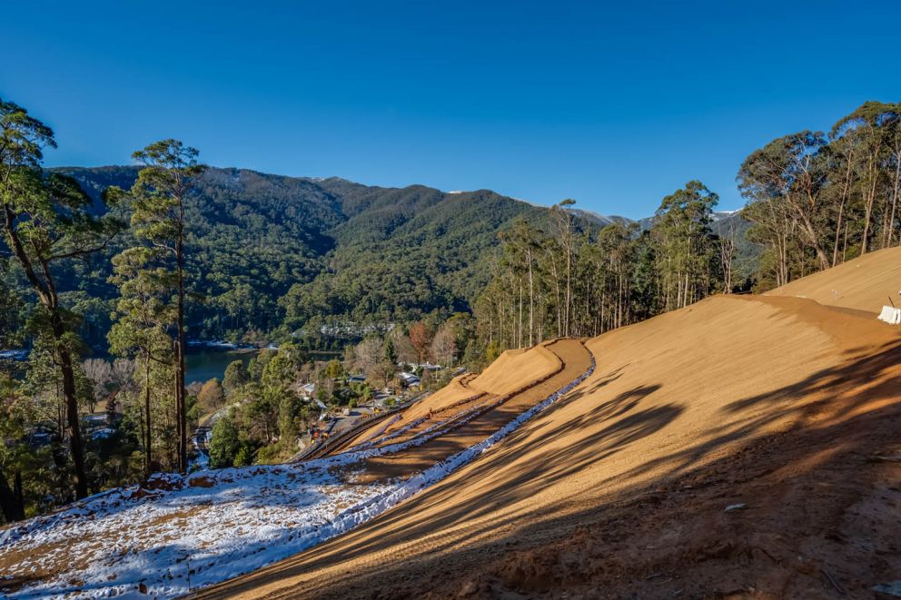 Snow on the middle benches of the Bogong High Plains Rd landslip