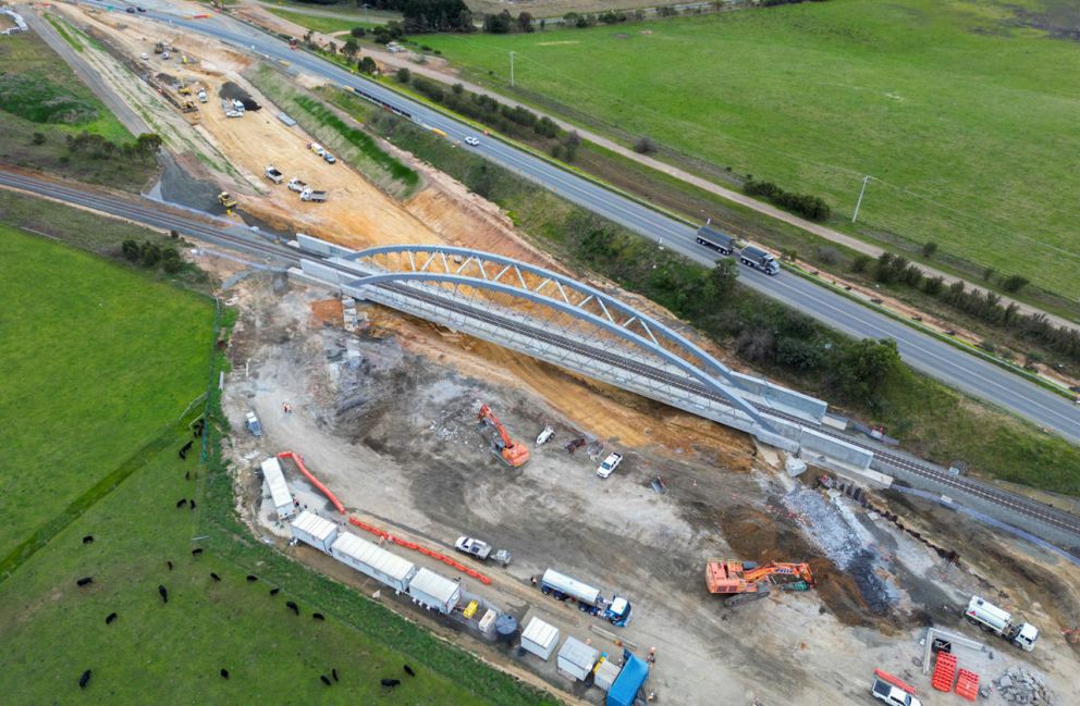 The new 95-metre steel rail arch bridge in place over the Gippsland rail line.