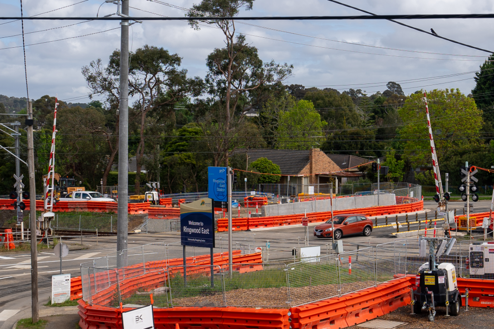 Cars driving through the reopened Dublin Road level crossing