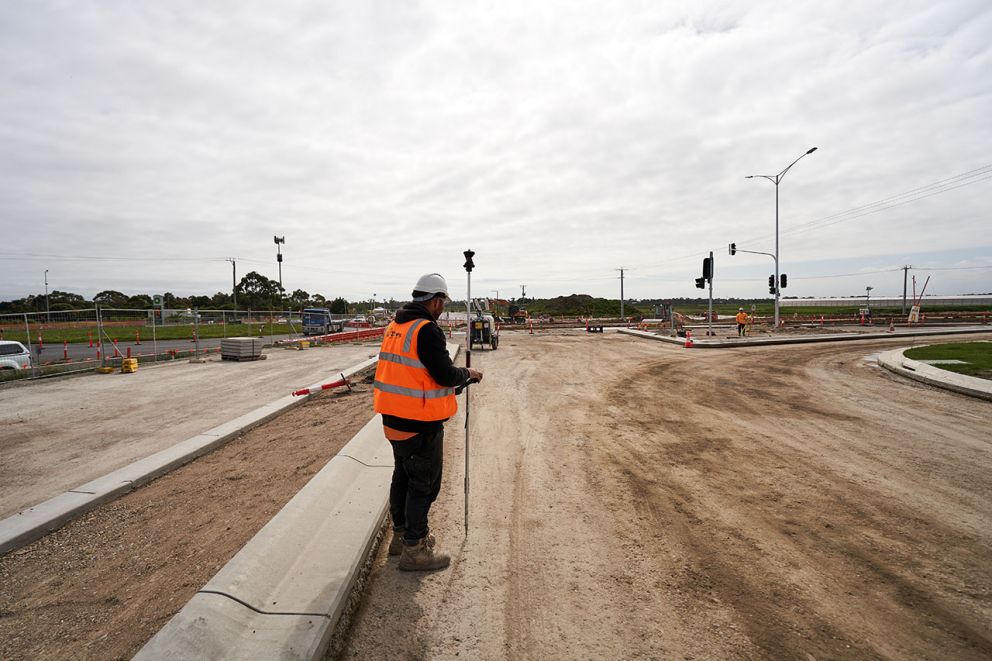 A surveyor getting to know the lay of the land during our construction blitz