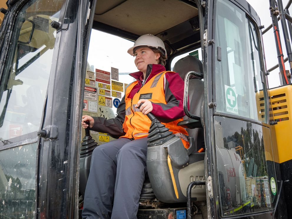 Kilbreda student operating a digger on the Burwood construction site.