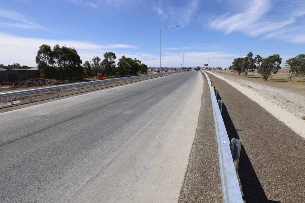 The widened freeway ramp ready for road markings to be painted.