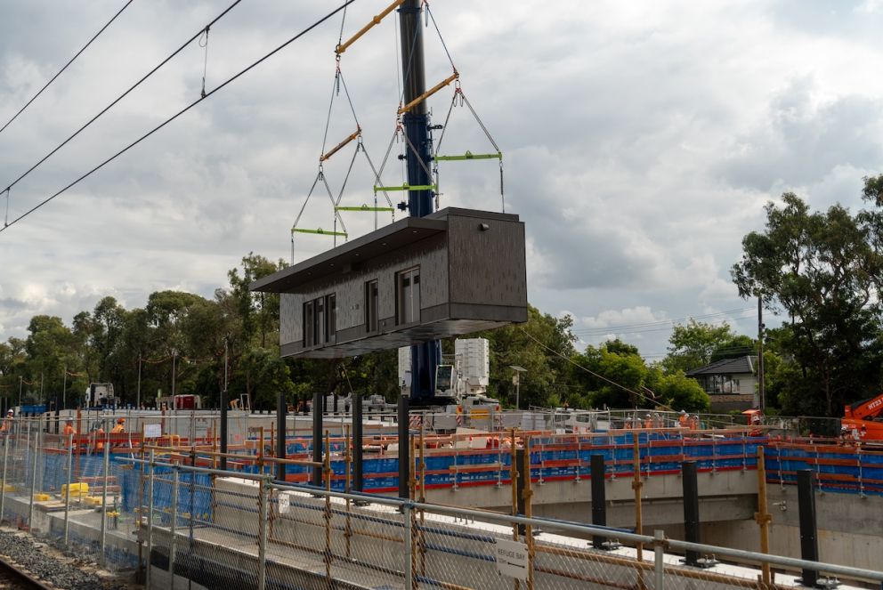 The station buildings being lifted into place