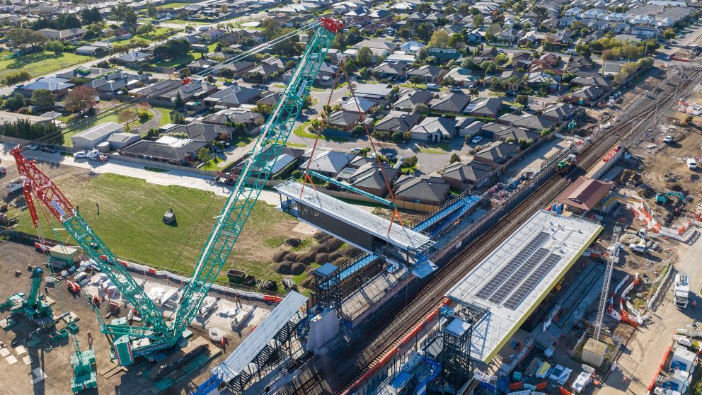 Marshall Station overpass is lifted into place. 