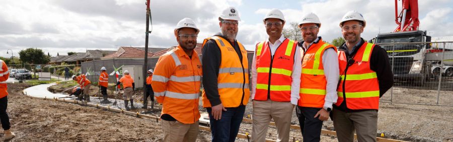 RMIT University’s Dr. Rajeev Roychand (pictured centre) celebrating the successful laying of coffee biochar concrete with MRPV and BildGroup staff on the Pakenham Roads Upgrade. Pictured from left: MRPV’s Kristian Horana and Paul Sklepic, RMIT University’s Dr. Rajeev Roychand and BildGroup’s Stephen Hill and Gary Fox.