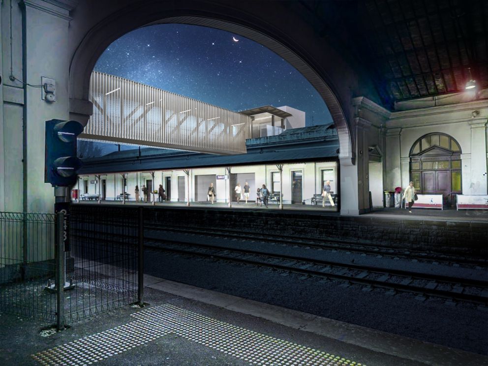 Nighttime view of the overpass from inside the train hall, looking to the south. Artist impression, subject to minor change. Design endorsed by Heritage Victoria