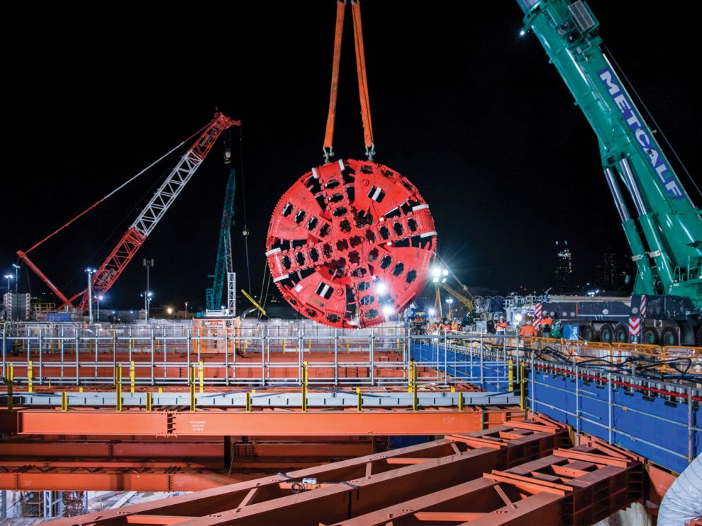 TBM being lifted down into the tunnel entrance point