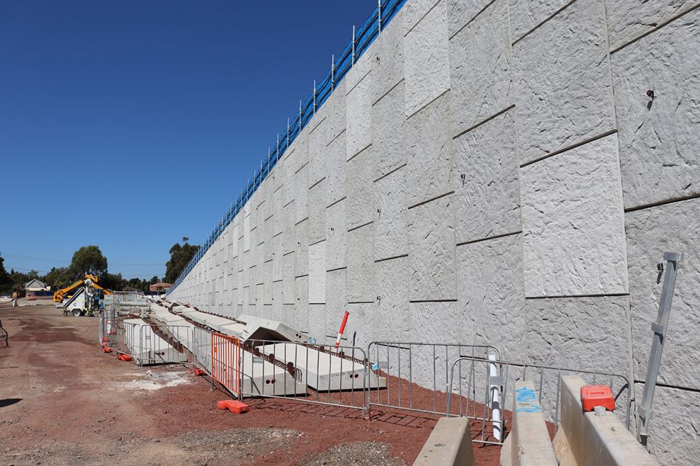 The new retaining wall forming the Old Calder Highway bridge