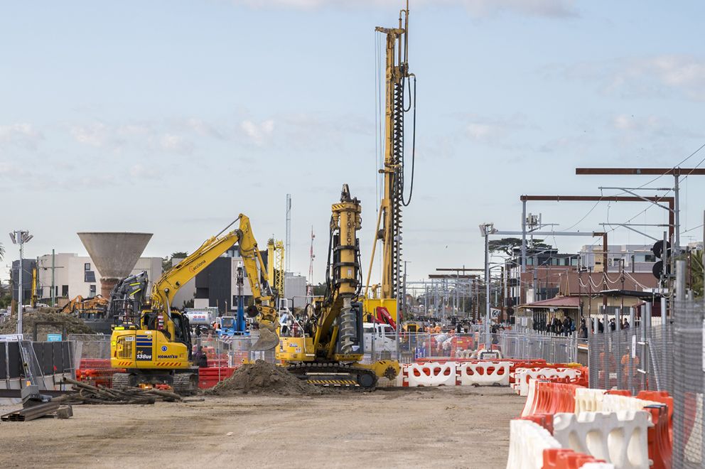 Piling rigs and excavators preparing the foundations for Mordialloc
