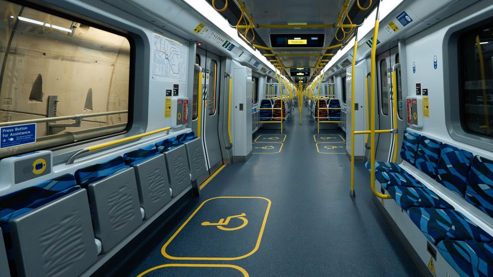 Priority seats are throughout the train, near the doors and windows.