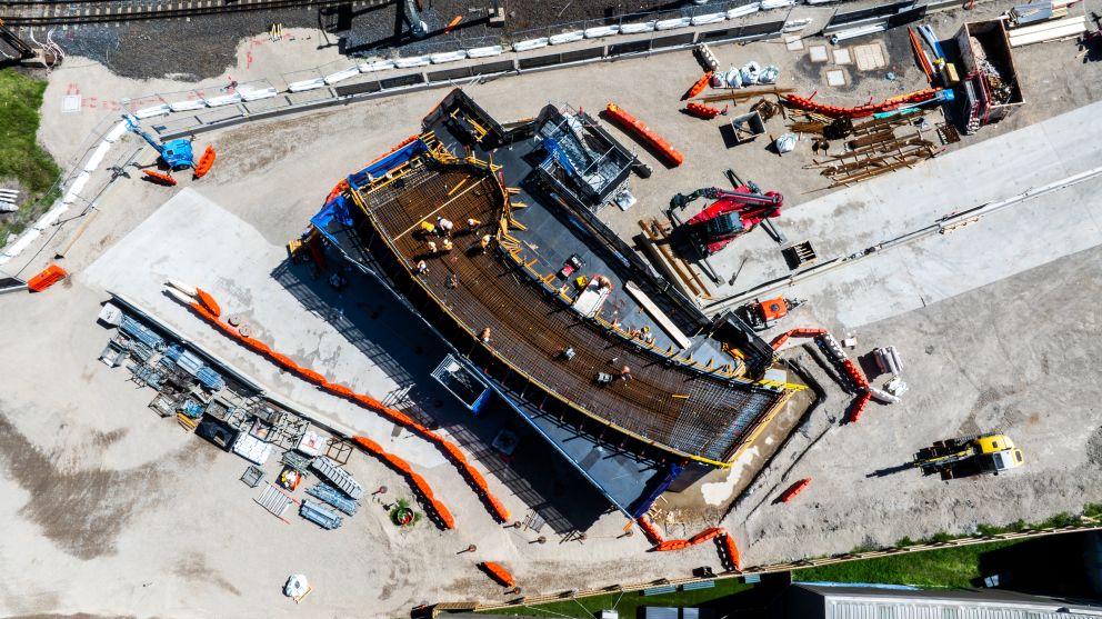 Workers laying the steel reinforcement for the pedestrian and cycling bridge over the rail line at Champion Road