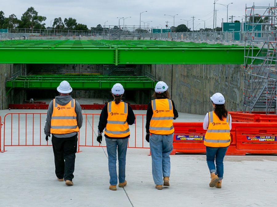 Construction works standing in front of the Eastern Tunnel entrance..