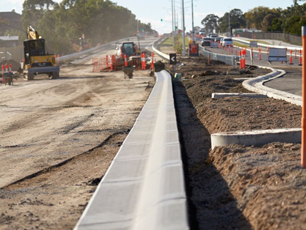 Image of the roadworks on Hallam Road with a curb down the center of the image.