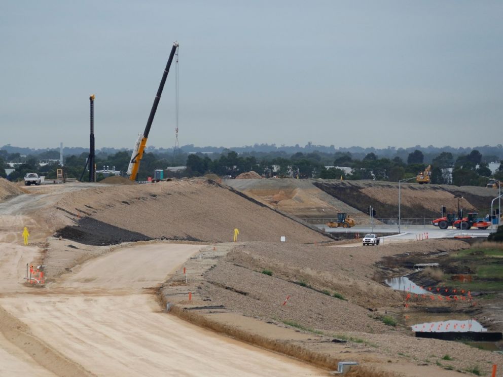 Continuing to build the Freeway between Governor Road and Bowen Parkway