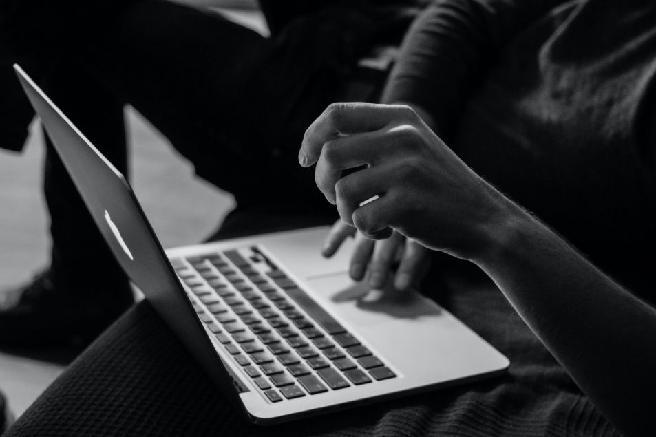 hands on a computer keyboard