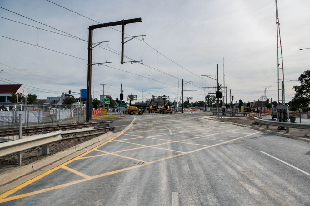 Road closed with construction workers