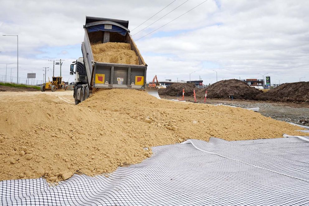 Tipping of Type B material on top of geogrid