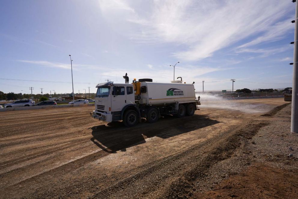 A water cart managing dust near the Western Port Highway and Hall Road roundabout