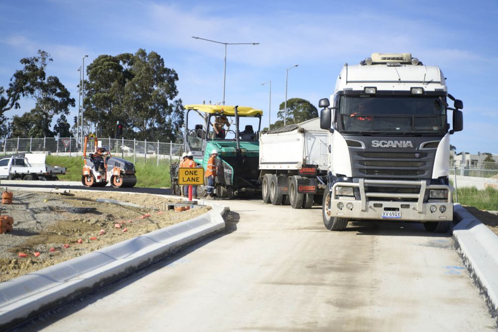 Asphalting new access to pebble patch