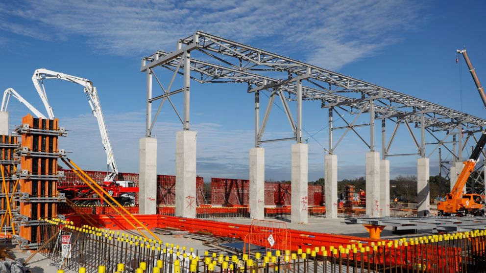 A very large outdoor conveyer belt is under construction