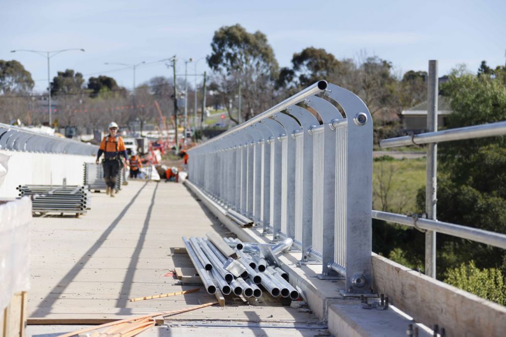 Installation of hand rails on the new bridge - Aug 23