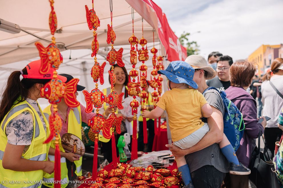 Community visiting Lunar New Year stall along Whitehorse Road.