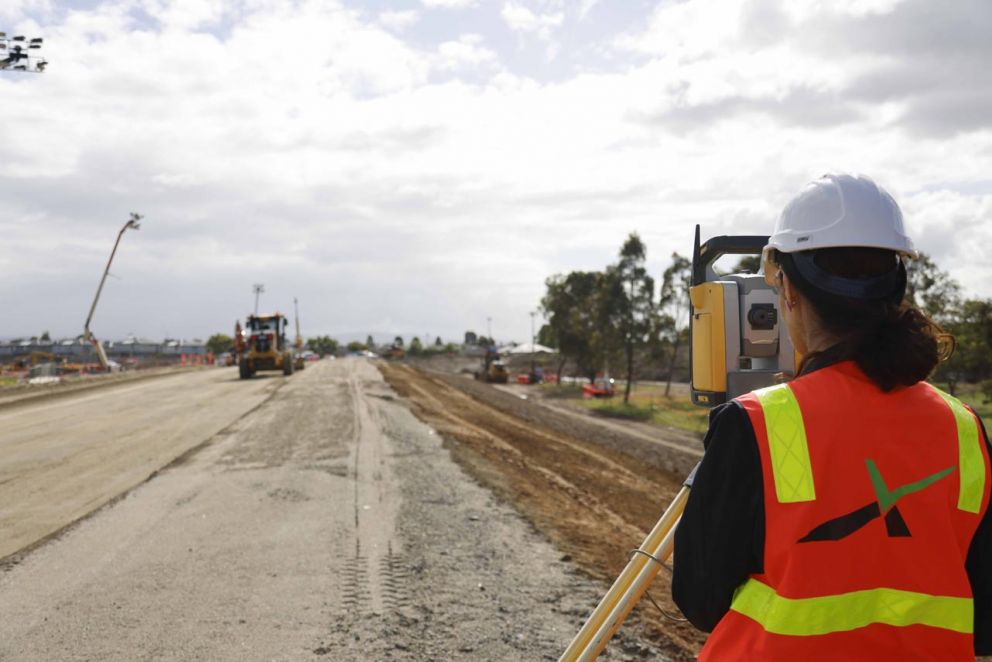 A surveyor on site making sure that works are completed to plan.